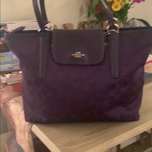 Signature purple medium sized Coach shoulder bag
